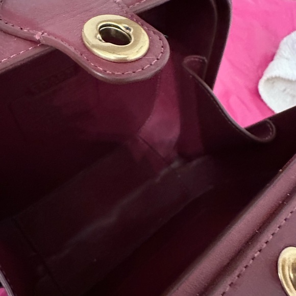 Burgundy Coach crossbody bag. Button open. Long shoulder strap. Leather. - Picture 4 of 6